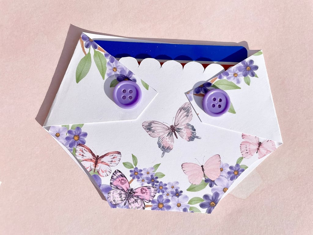 diaper shaped baby shower gift card holder with butterfly print and purple buttons