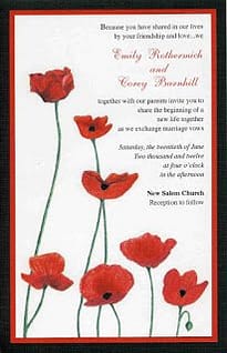 a red and black layered wedding invitation with poppy plowers