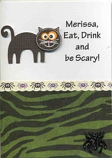 A spooky black cat is on the front of this halloween card. Personalized with a name