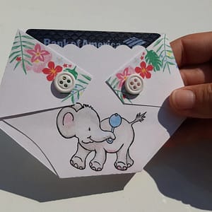 diaper shaped gift card holder with an elephant holding a rattle