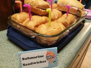 Sub sandwiches with periscopes "submarines" ocean themed party food ideas