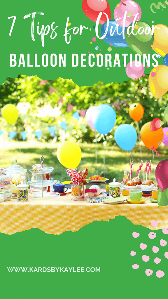 outdoor birthday party setup with balloons floating over a table