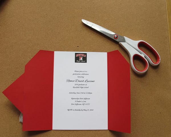 handcrafted graduation invitation in the shape of a cap and gown