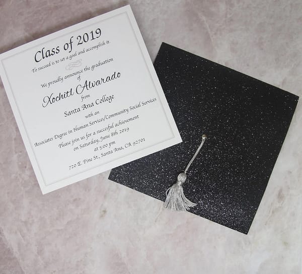 black glitter cap shaped graduation invitation or announcement