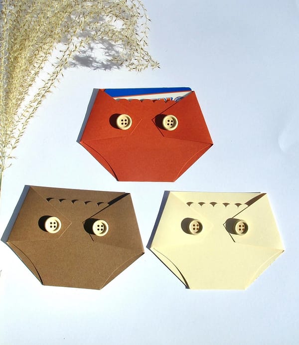 three diaper shaped gift card holders in fall colors