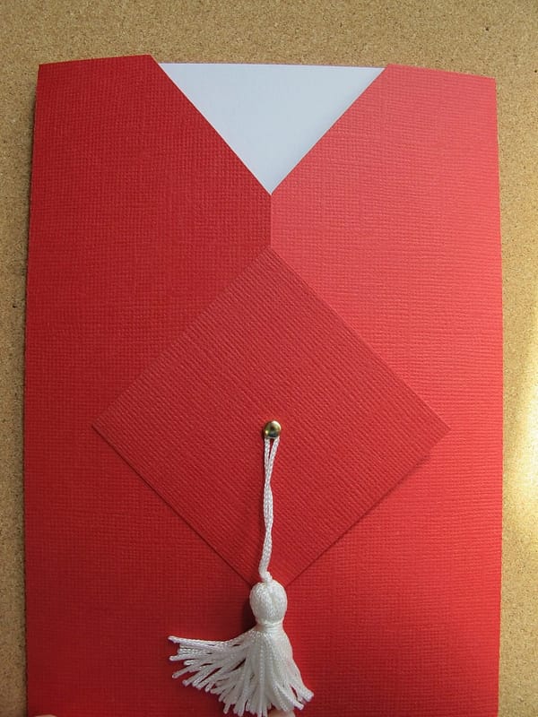 paper crafted red cap and gown invite with real tassel