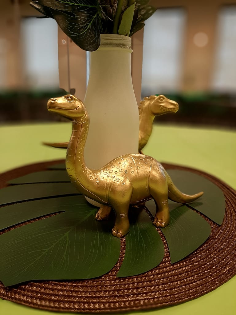gold dinosaur centerpieces at baby shower
